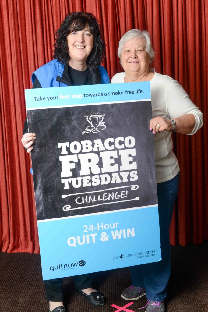 Judy Logan, BC Lung Association Volunteer Director with QuitNow’s Louise Mott encourages Powell River citizens who smoke to commit to quit for 24 hours for a chance to win $250.