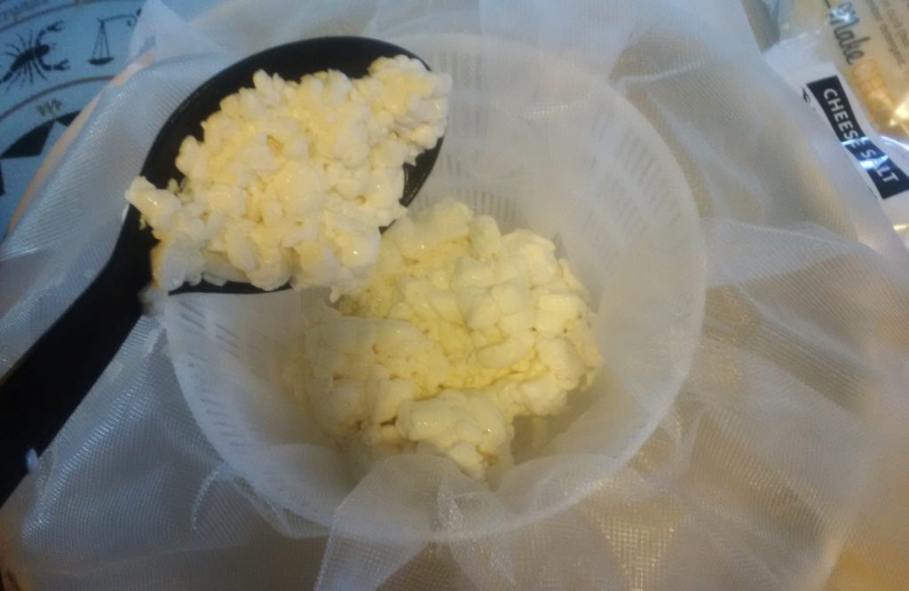 Feta, draining away the whey before it's left to age for a few days.