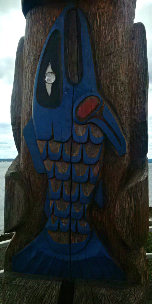 Hereditary Hagoos Totem Pole designed and carved by Master Carver Jackie MukSamma Timothy of the Tla'Amin First Nation.